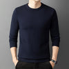 Knitted sweater with semi-high collar and round neckline in yarn