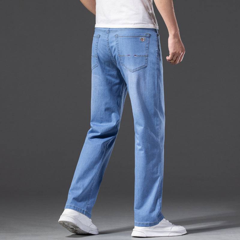 Jeans larghi oversize da uomo con effetto elasticizzato e snellente