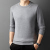 Knitted sweater with semi-high collar and round neckline in yarn