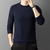 Knitted sweater with semi-high collar and round neckline in yarn
