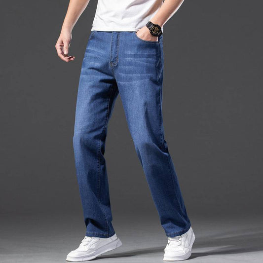 Jeans larghi oversize da uomo con effetto elasticizzato e snellente