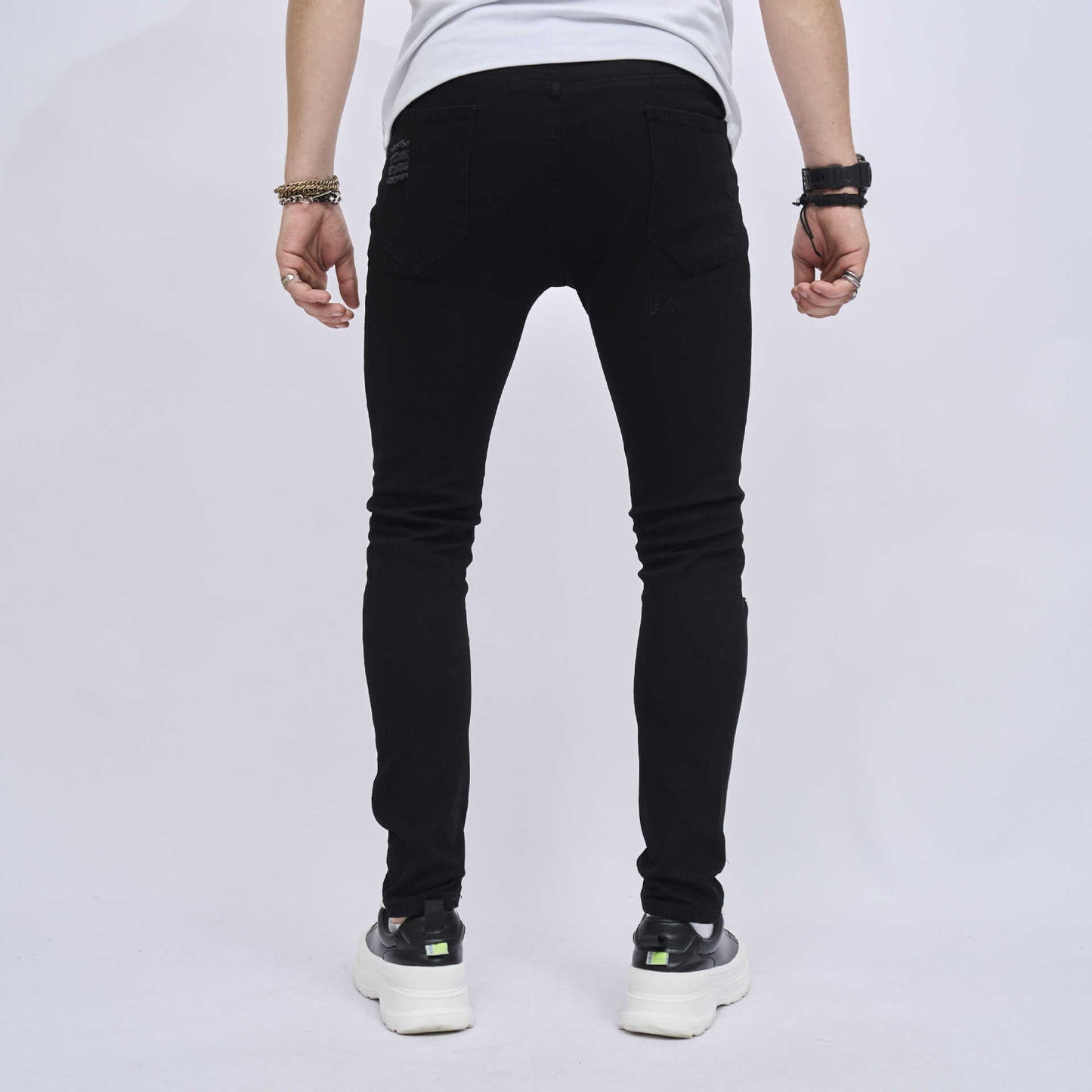 Jeans elasticizzati skinny slim fit strappati da uomo