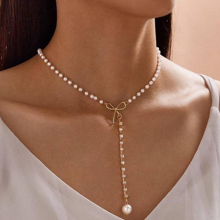 European And American Graceful Bow Long Pearl Tassel Pendant Necklace - YLORESHOP