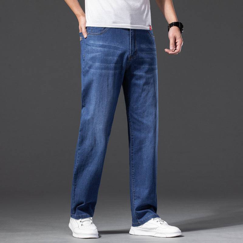 Jeans larghi oversize da uomo con effetto elasticizzato e snellente