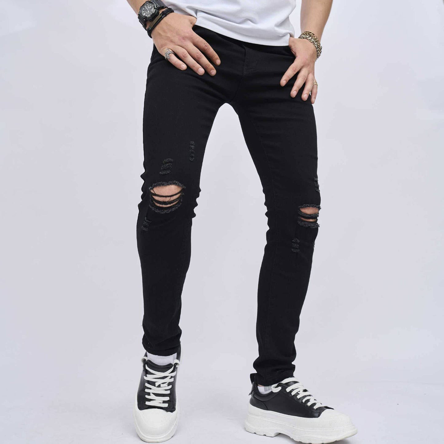 Jeans elasticizzati skinny slim fit strappati da uomo