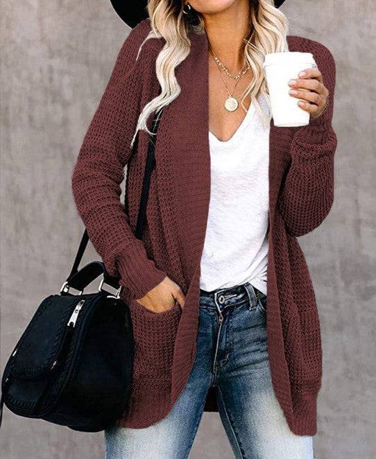 Cardigan maglione lavorato a maglia con abbottonatura curva da donna