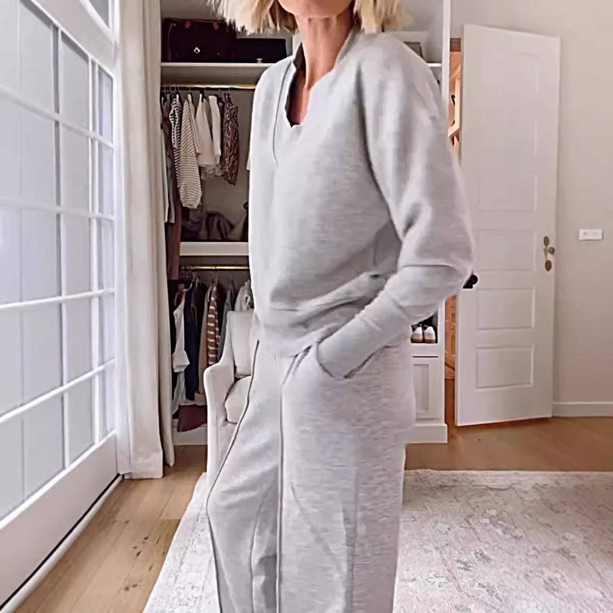 Set da due pezzi con pantaloni larghi a gamba larga e maniche lunghe con scollo a V