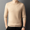 Knitted sweater with semi-high collar and round neckline in yarn