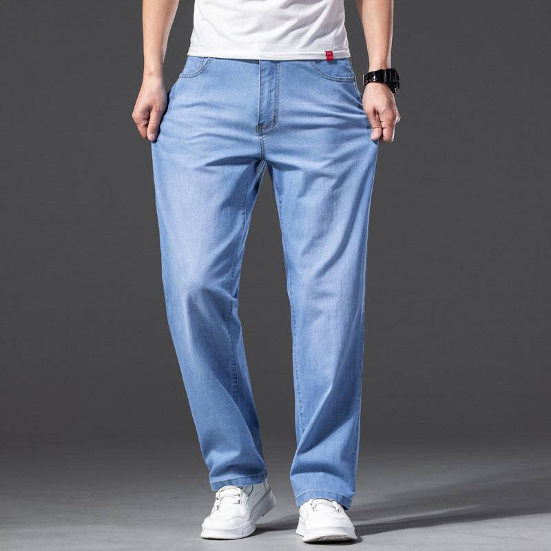 Jeans larghi oversize da uomo con effetto elasticizzato e snellente