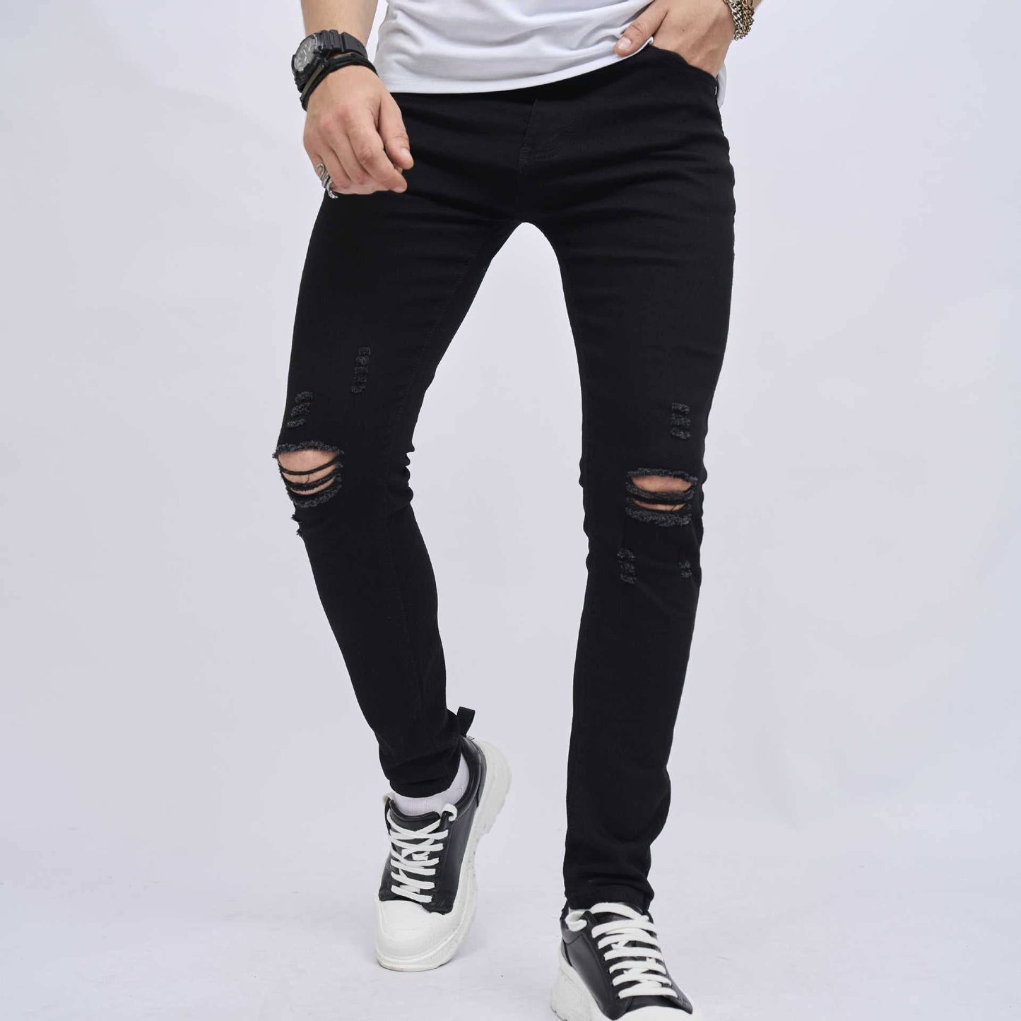 Jeans elasticizzati skinny slim fit strappati da uomo