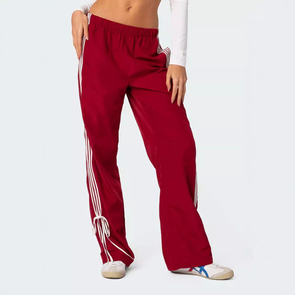 Pantaloni a gamba dritta con colori a contrasto con quattro barre sportive abbinabili alla moda casual