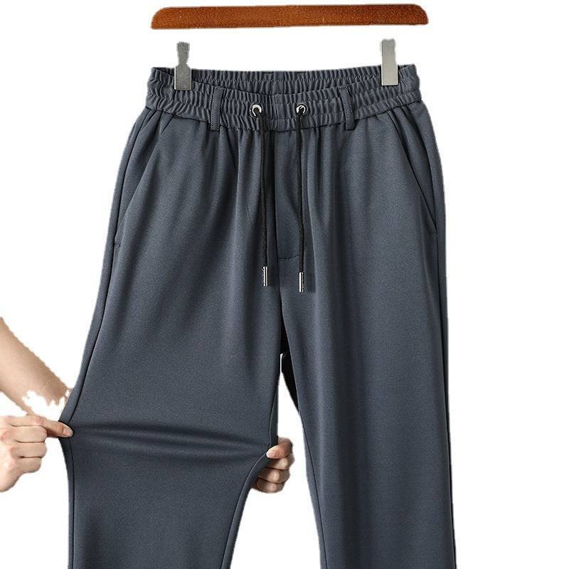 Pantaloni casual da lavoro elasticizzati dritti larghi da uomo in vita elastica